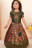 Green Brocade Pattu Pavadai With Bead Work And Zardosi Work For Girls