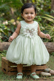 Mint Green Party Frock with Oversized Floral Appliqué and Pleated Shine Finish For Girls