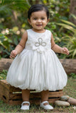 White Party Frock with Oversized Floral Appliqué and Pleated Shine Finish For Girls