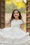 White Layered High-Low Party Frock With Tailback For Girls