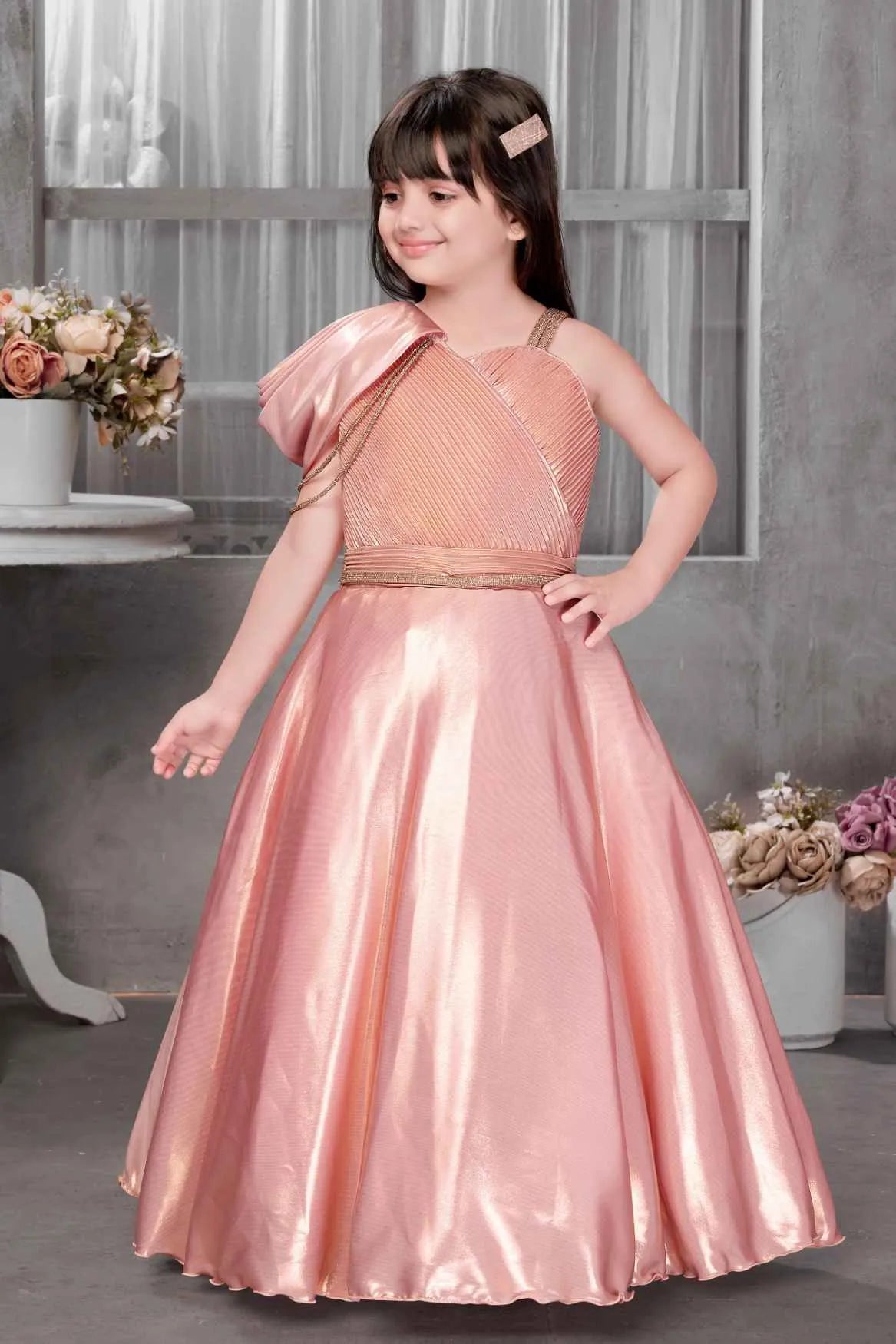 Shimmery Peach One-Shoulder Party Wear Gown With Draped Detail For Gir Lagorii Kids Shimmery Peach One-Shoulder Party Wear Gown With Draped Detail For Gir Lagorii Kids