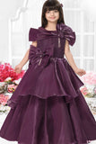 Wine Layered Party Wear Gown with Statement Bow Accents For Girls