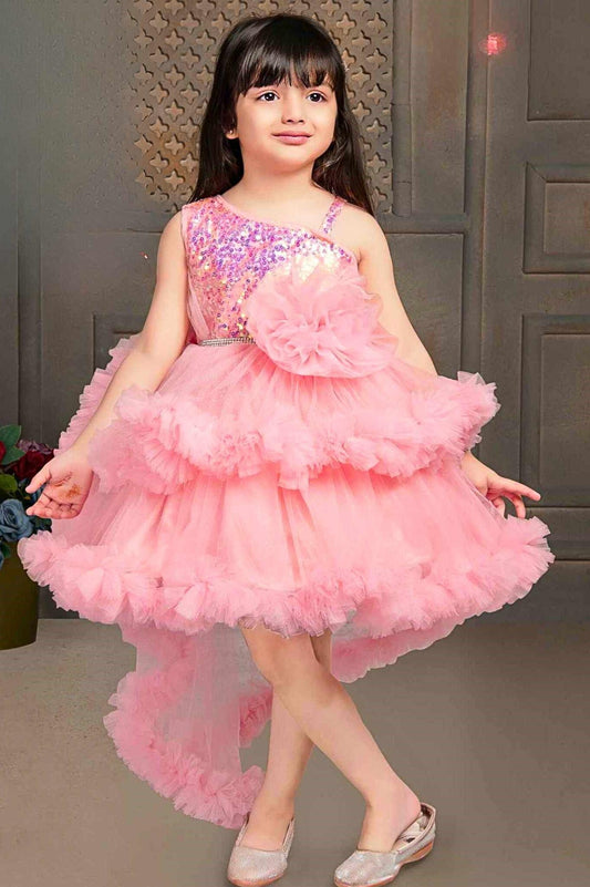 Peach Shimmer Tailback Party Wear Frock With Ruffle Layers For Girls