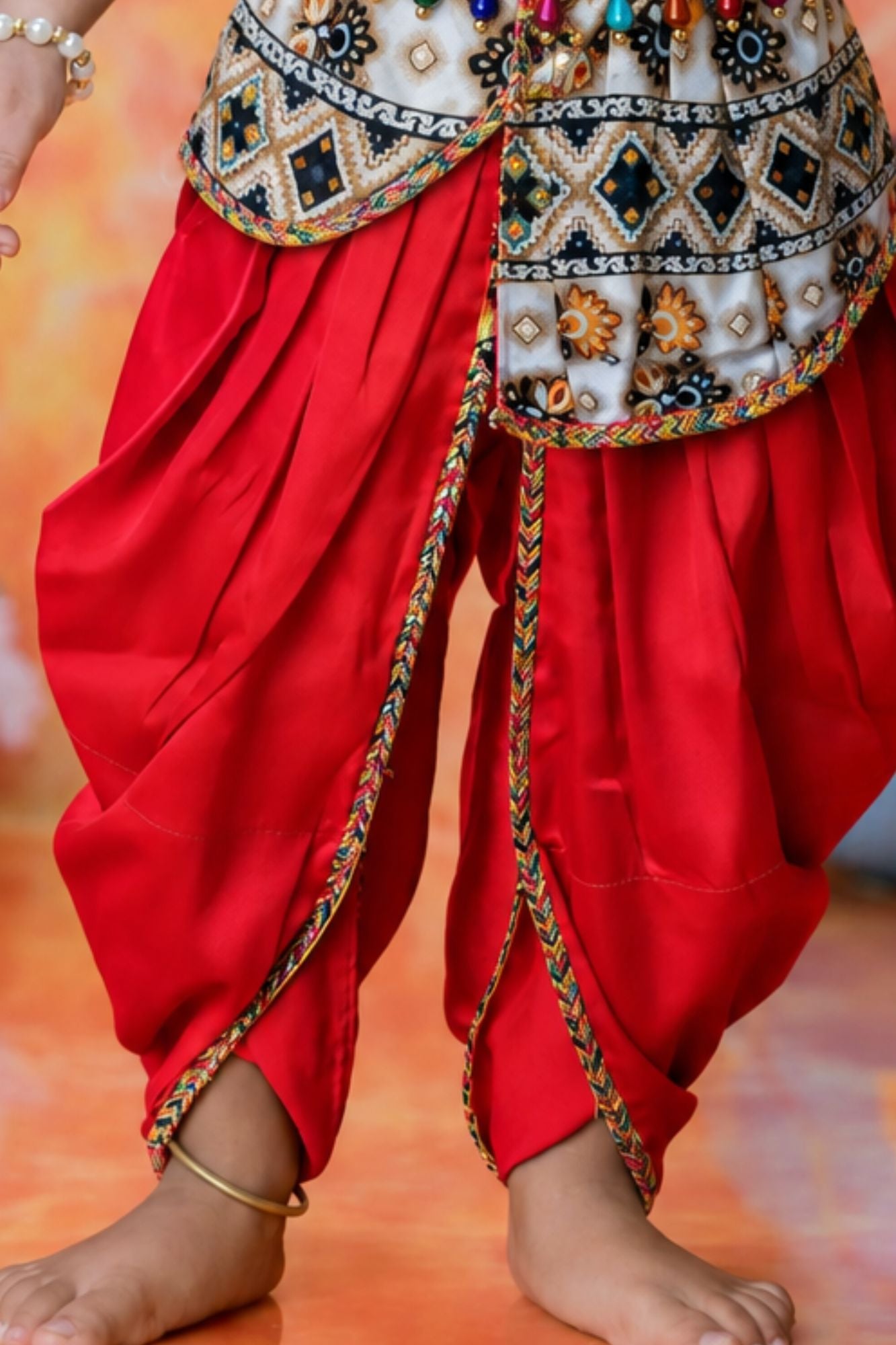 Boys Red Geometric And Floral Printed Krishna Dhoti Set with Accessories