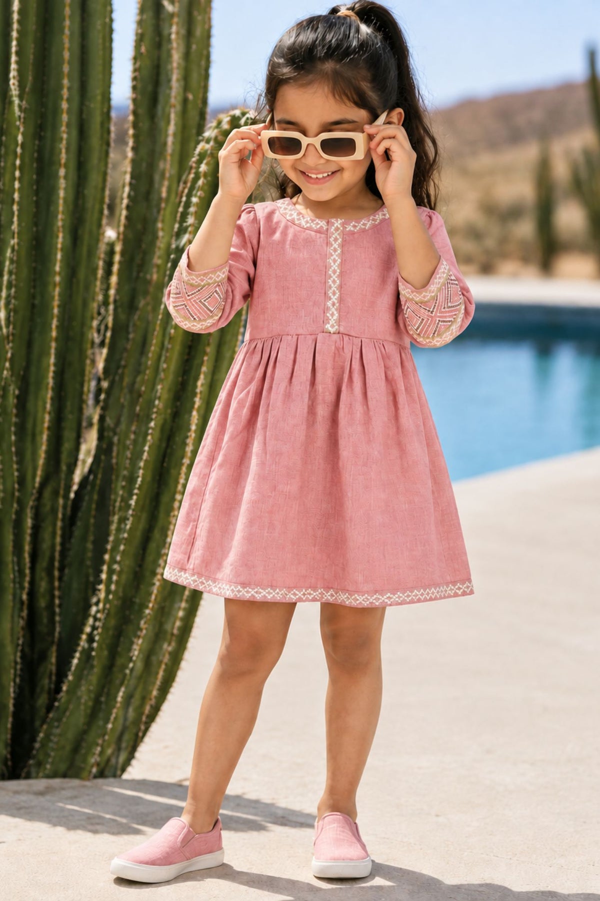 Baby Pink Textured Cotton Dress with Embroidered Border For Girls