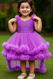 Purple Ruffle Party Frock With Stone Embellished And High-Low Hem For Girls