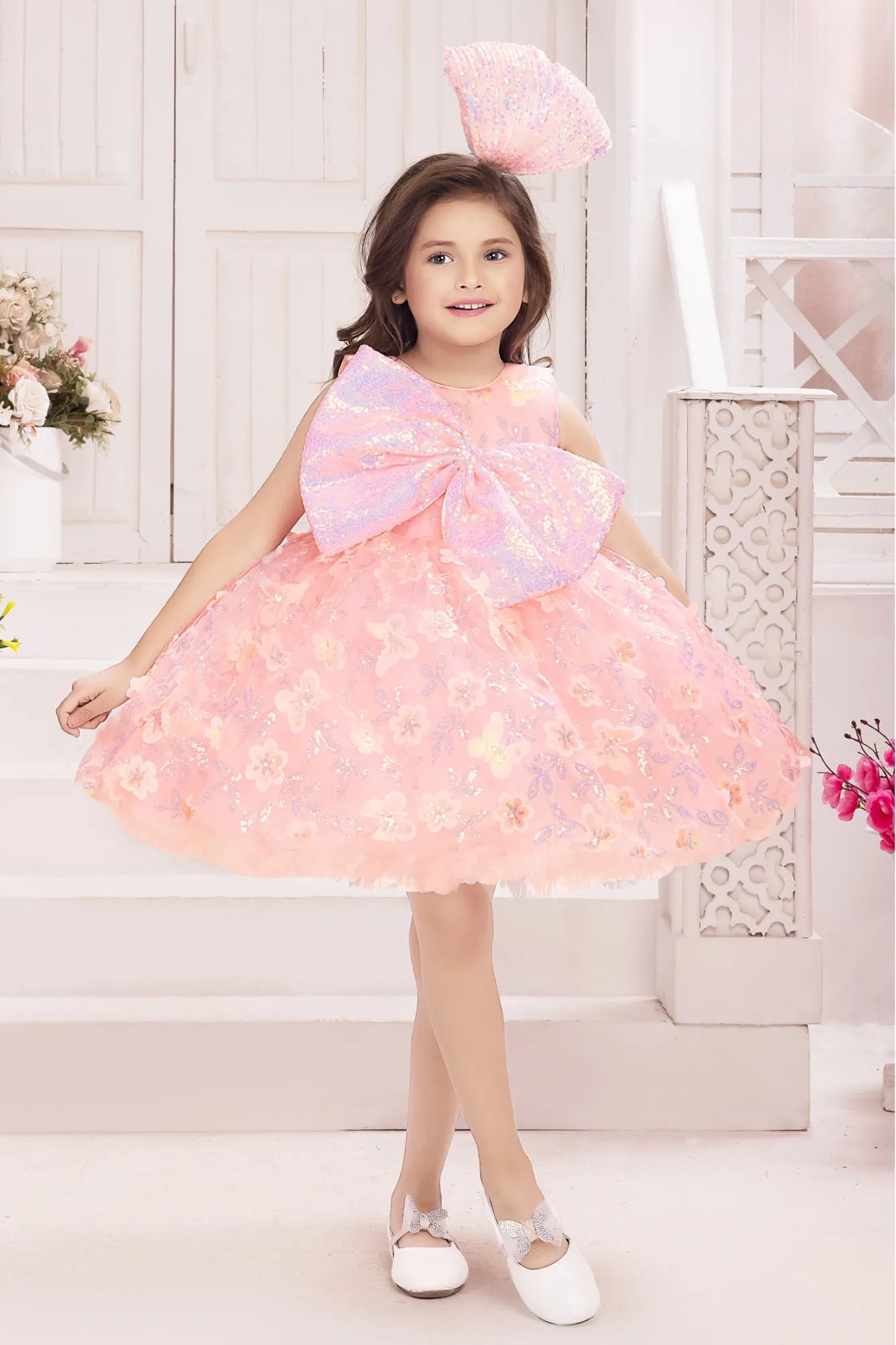 Peach Sequin Bow Party Wear Frock With 3D Floral Embellishments For Girls