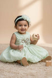 Mint Green Party Frock with Oversized Floral Appliqué and Pleated Shine Finish For Girls