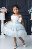 Ice Blue Sequin Layered Ruffle Party Wear Frock With Statement Bow For Girls