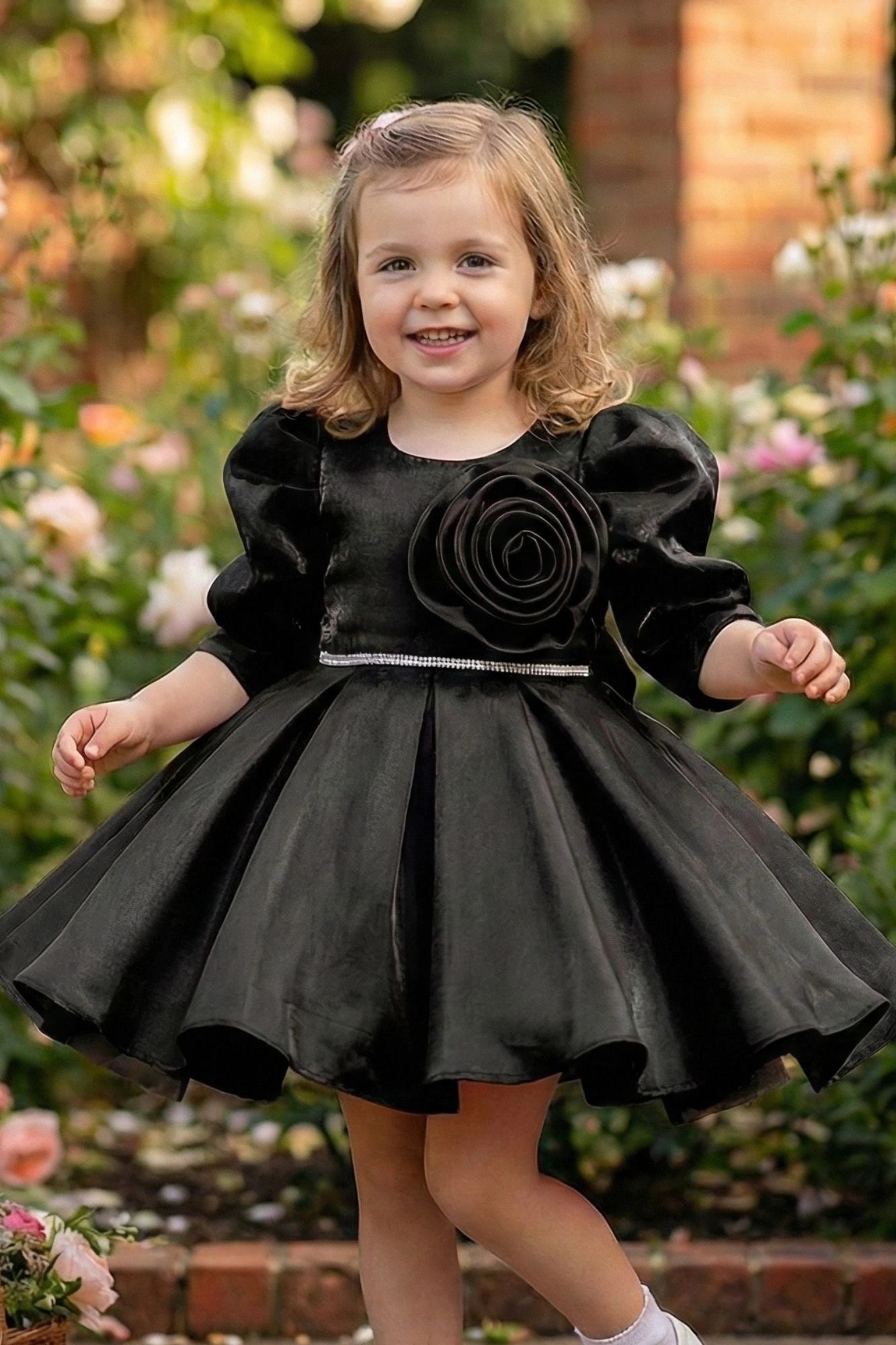 Black Party Wear Frock with Puffy Sleeves & Statement Rose Appliqué For Girls