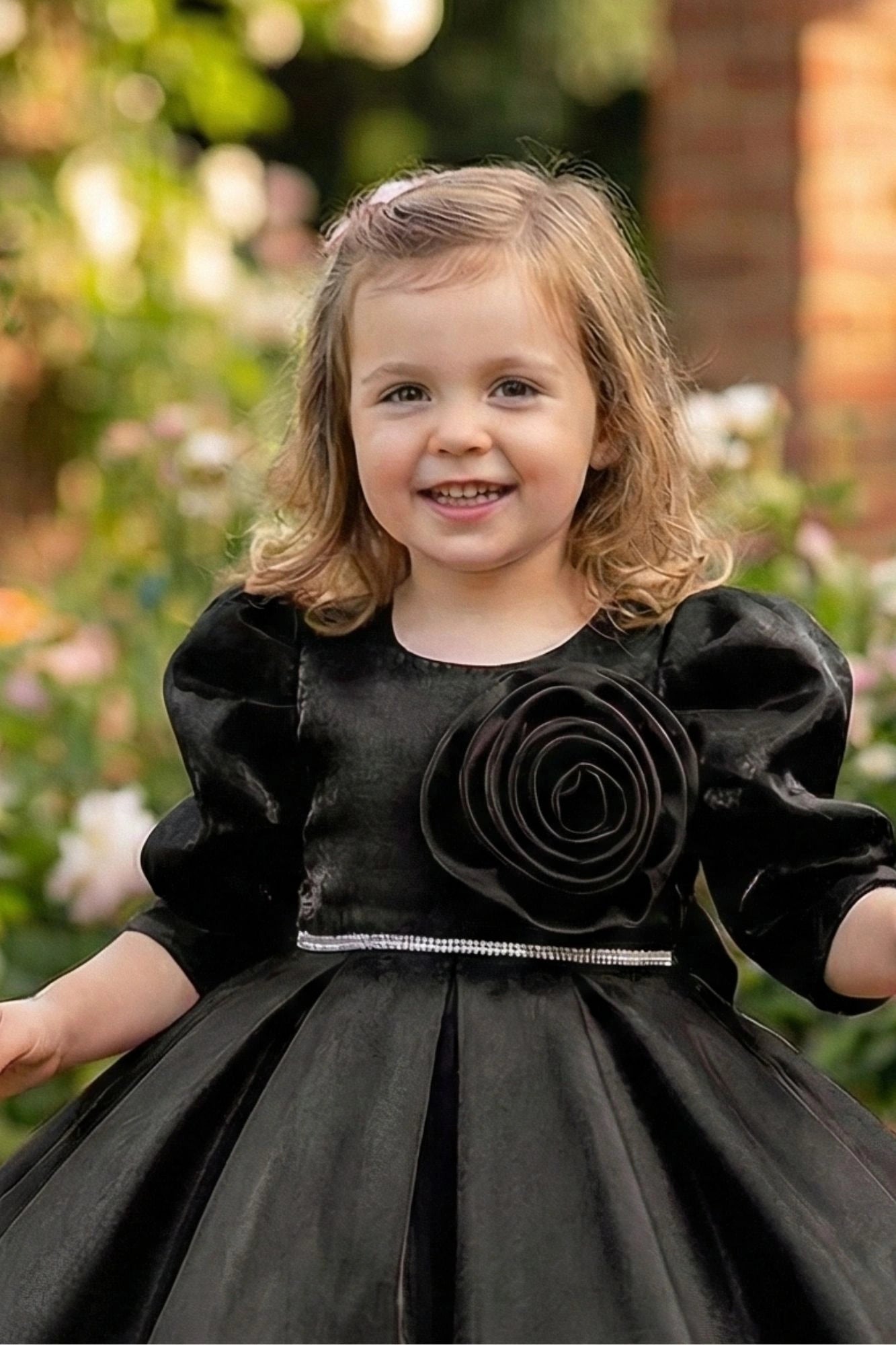 Black Party Wear Frock with Puffy Sleeves & Statement Rose Appliqué For Girls