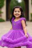 Purple Ruffle Party Frock With Stone Embellished And High-Low Hem For Girls