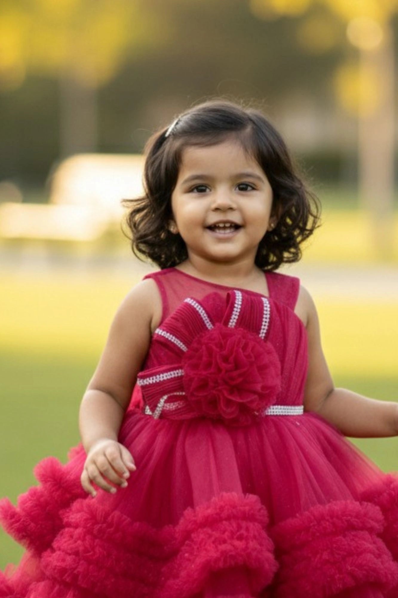 Pink Party Frock with Ruffled Layers and Statement Bow and Tailback For Girls