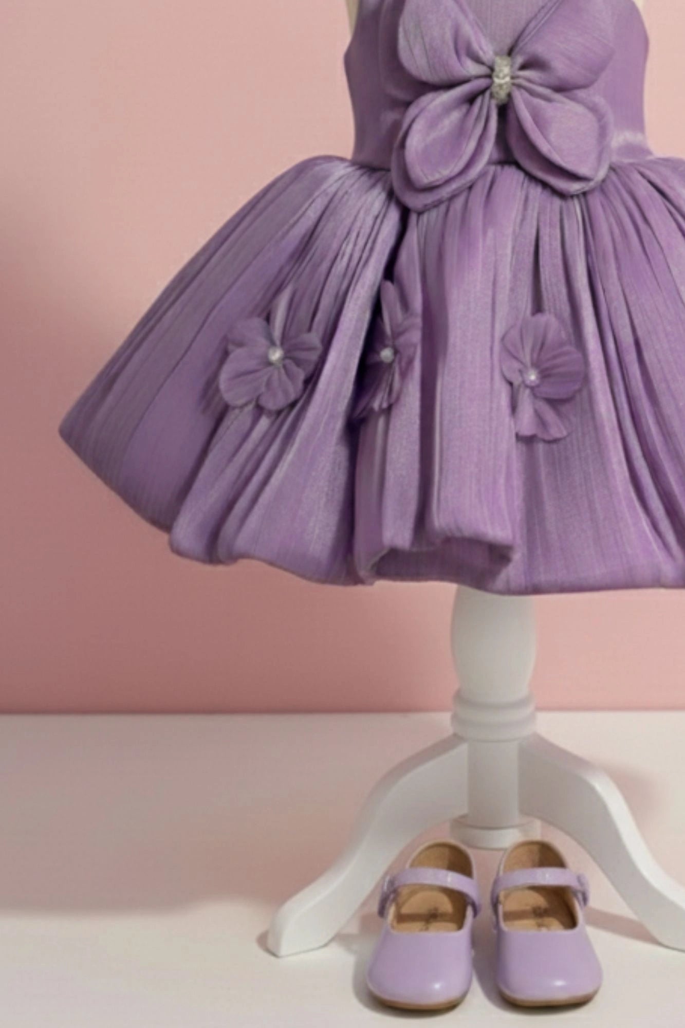 Lavender Party Wear Frock with 3D Floral Appliqué and Bow Accent For Girls