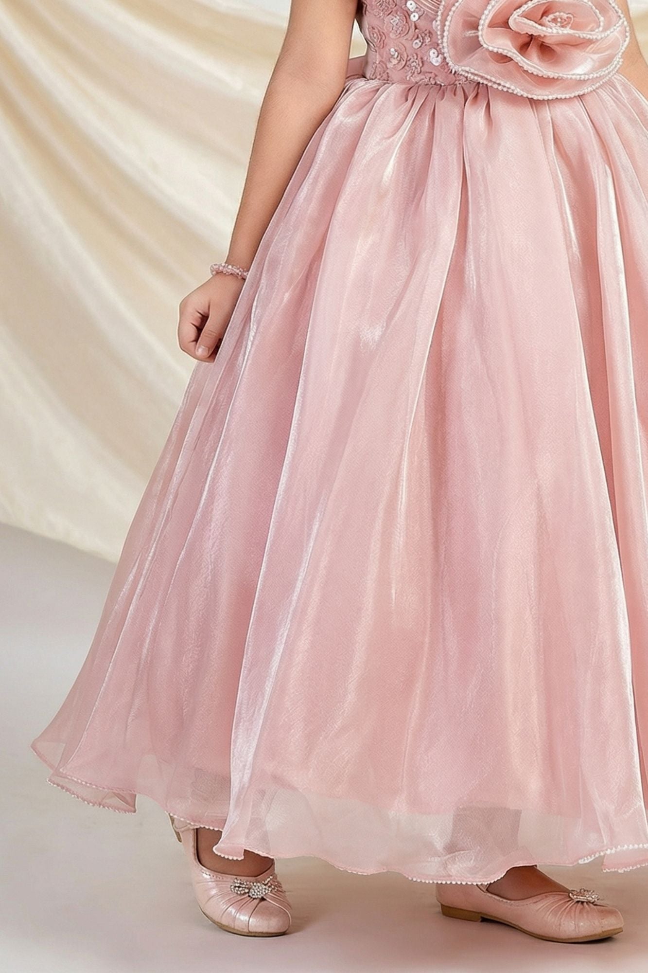 Designer Peach Embellished Rosette Party Gown For Girls