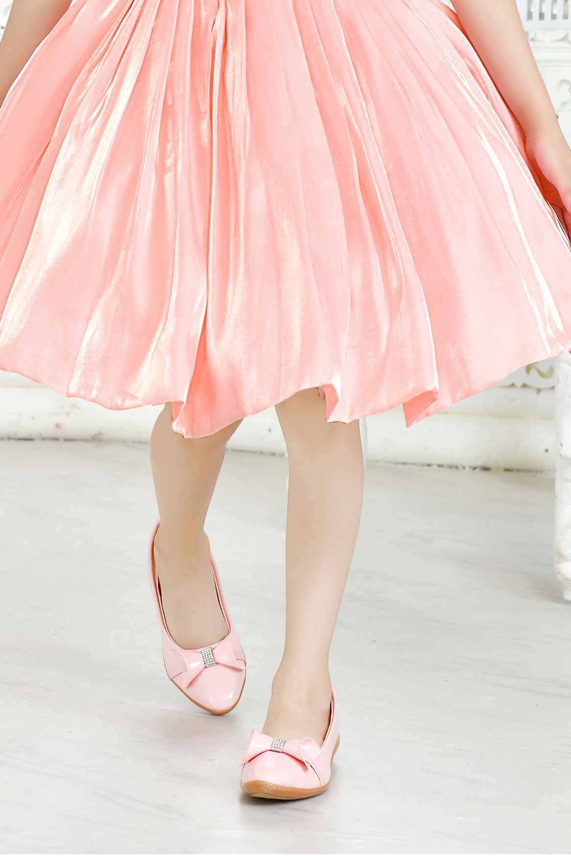 Peach Partywear Frock Embellished With Flowers For Girls