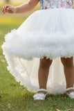 White Party Frock with Floral Bodice and Ruffled Hemline And Tailback For Girls