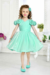 Green Partywear Frock Embellished With Flowers For Girls