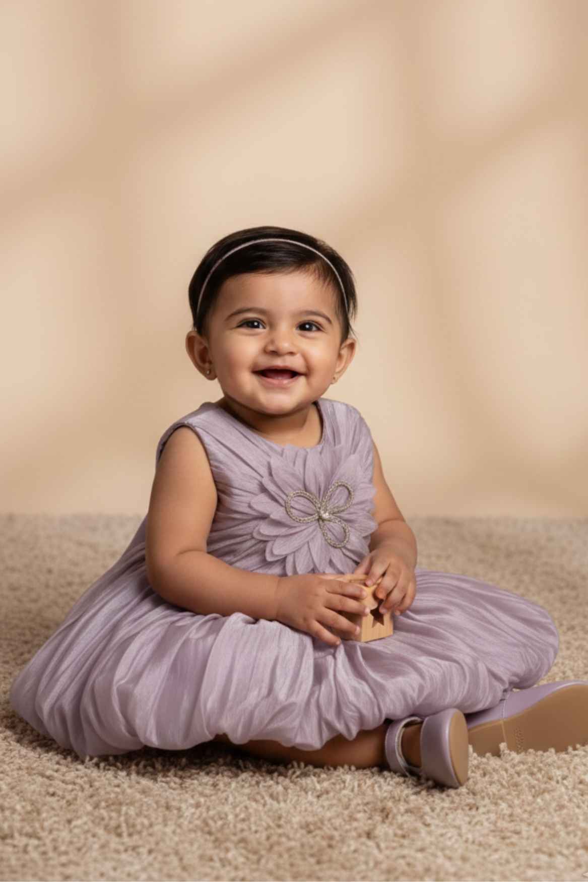 Mauve Party Frock with Oversized Floral Appliqué and Pleated Shine Finish For Girls