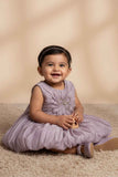 Mauve Party Frock with Oversized Floral Appliqué and Pleated Shine Finish For Girls