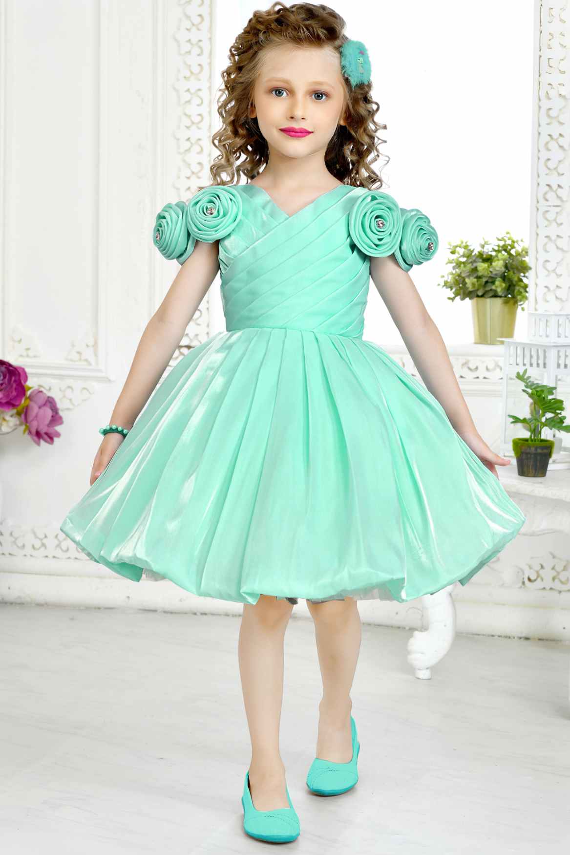 Green Partywear Frock Embellished With Flowers For Girls