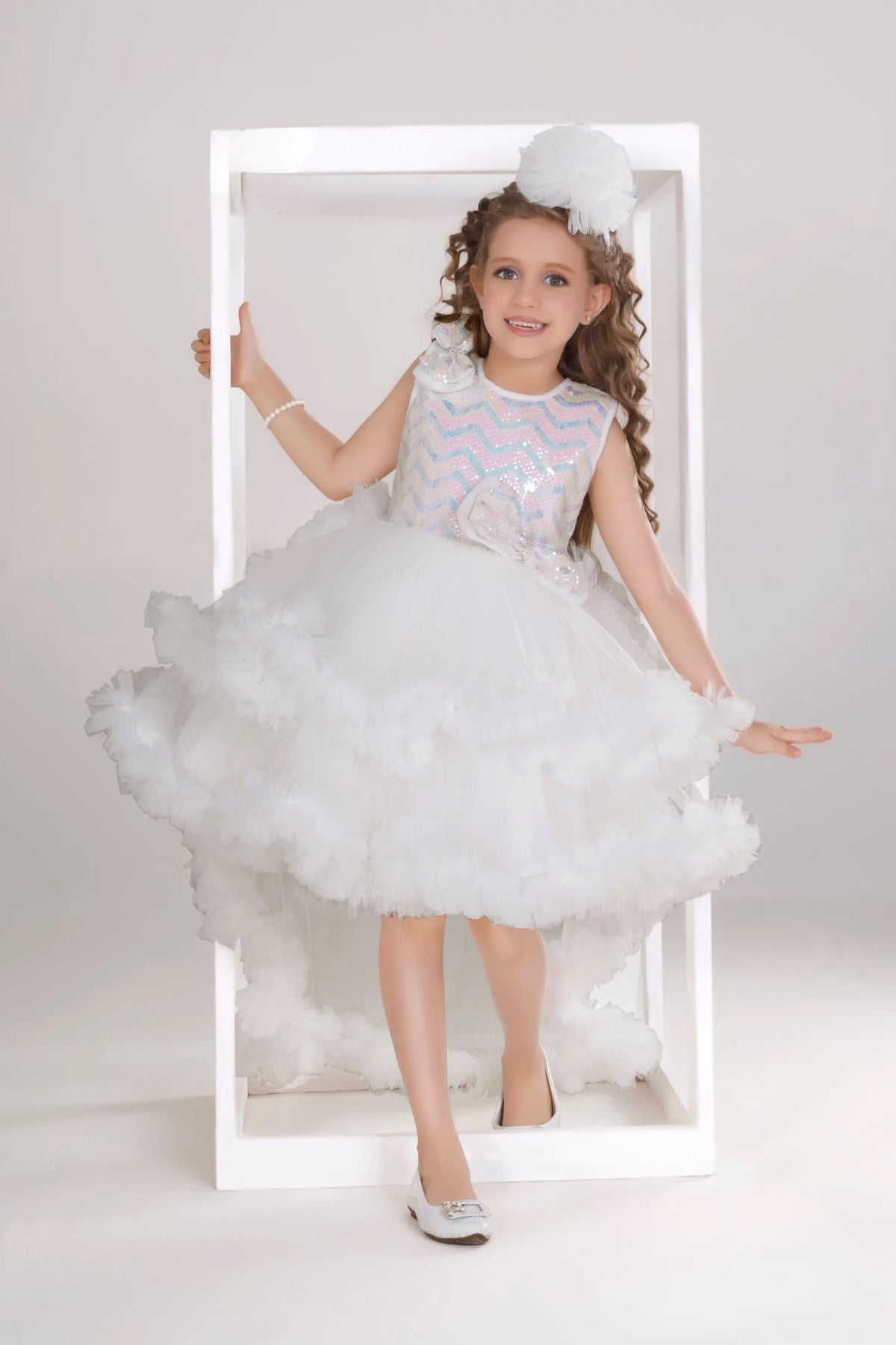 White Ruffle Party Gown with Sequin Bows and High-Low Hem For Girls