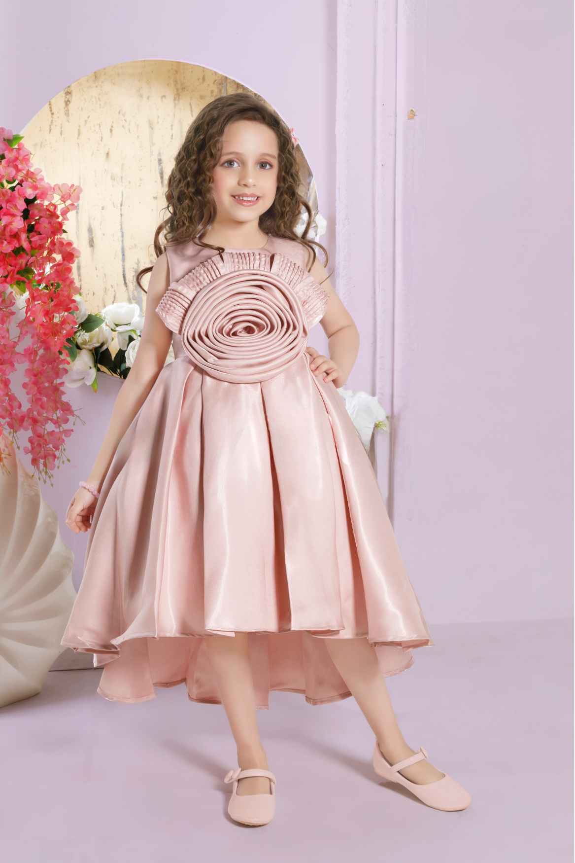Peach Sleeveless And Floral Embellished Tailback Frock For Girls