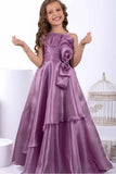 Designer Mauve Bow Embellished And Stone Work Party Wear Gown For Girls