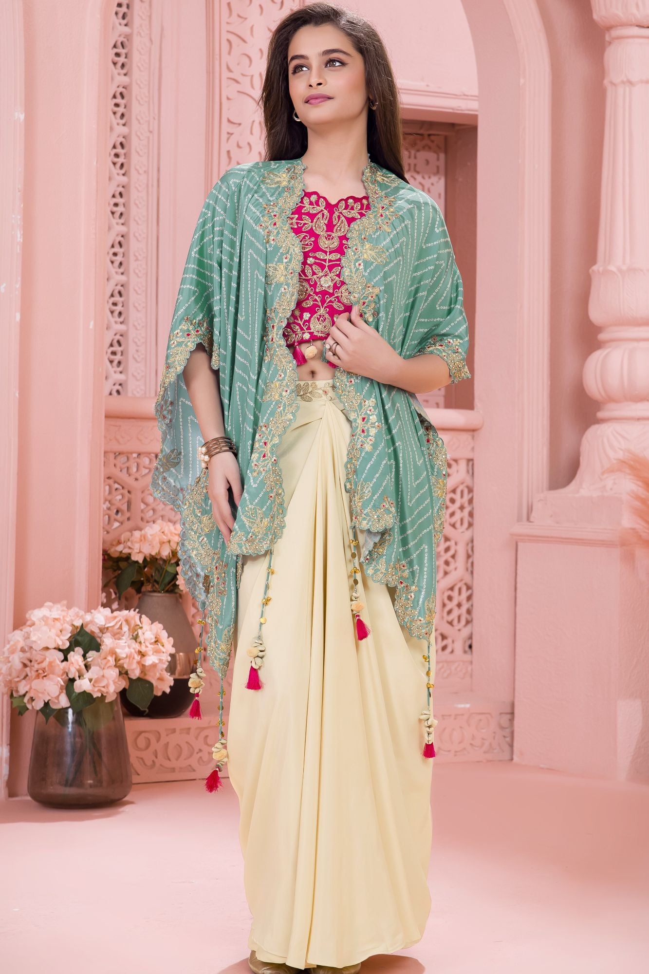 Rani Pink Embroidered Top With Cream Dhoti Skirt And Cape Set For Girls