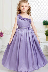 Purple Gown With Floral Embellished And Stone Waist Band For Girls