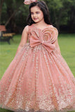 Peach Gown With Bow Embellished And Shimmer Printed For Girls