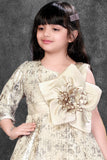 Fawn Sequin Party Wear Gown With One-Shoulder Sleeve And Statement Floral Bow For Girls
