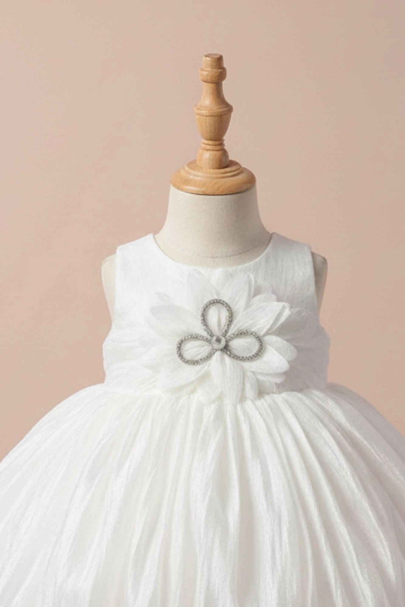 White Party Frock with Oversized Floral Appliqué and Pleated Shine Finish For Girls