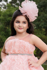 Peach Gown With Ruffled And Stone Waist Band For Girls