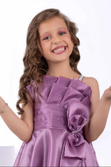 Designer Mauve Bow Embellished And Stone Work Party Wear Gown For Girls