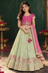 Girls Pista Green And Pink Embroidered Pattu Pavadai Set