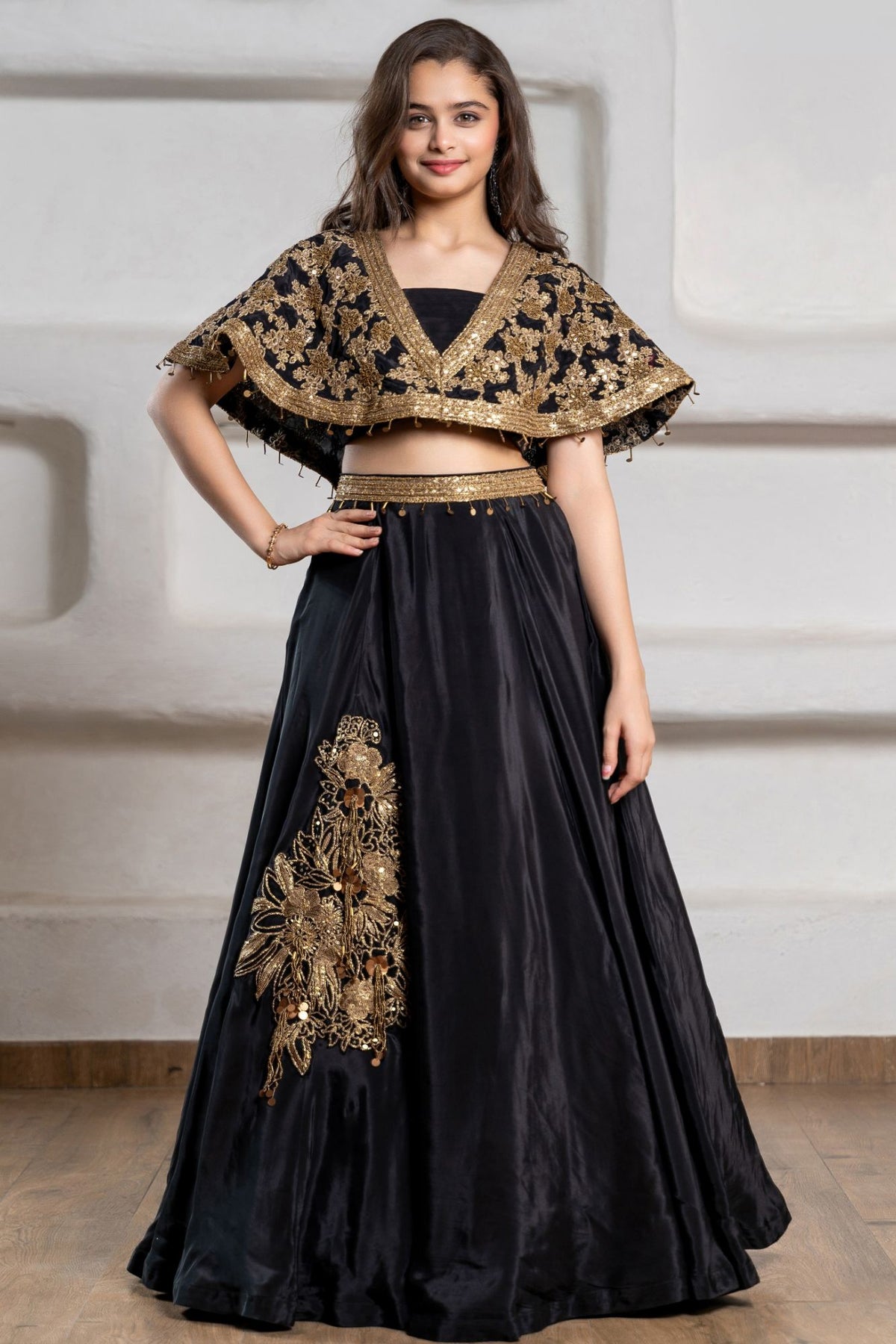 Girls Black And Gold Embroidered Cape Lehenga Choli