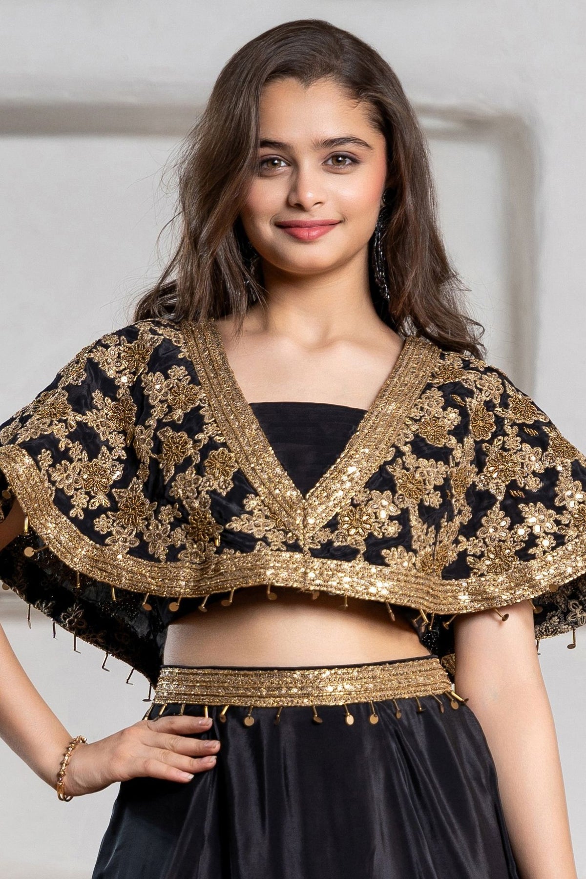Girls Black And Gold Embroidered Cape Lehenga Choli