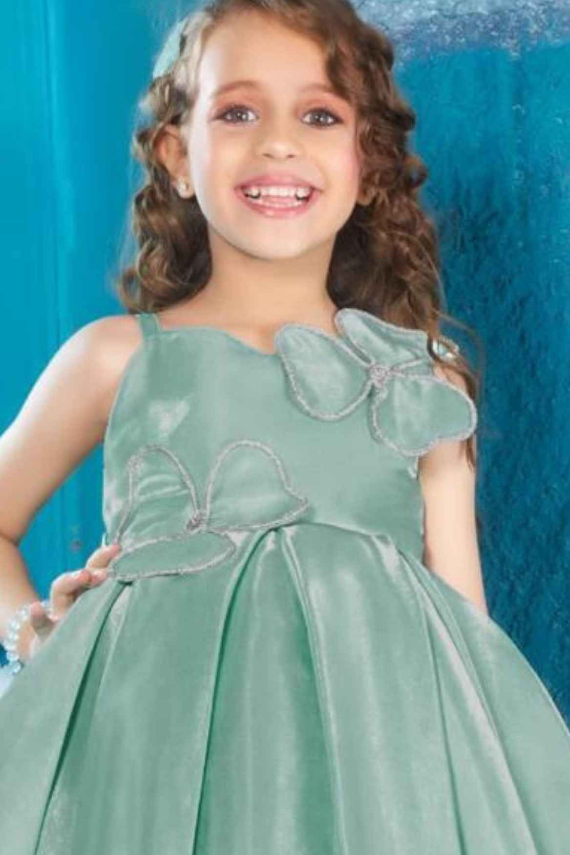 فستان أخضر بحري مزين بالأحجار والزهور للبنات