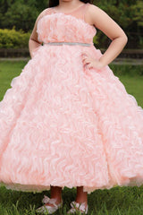 Peach Gown With Ruffled And Stone Waist Band For Girls