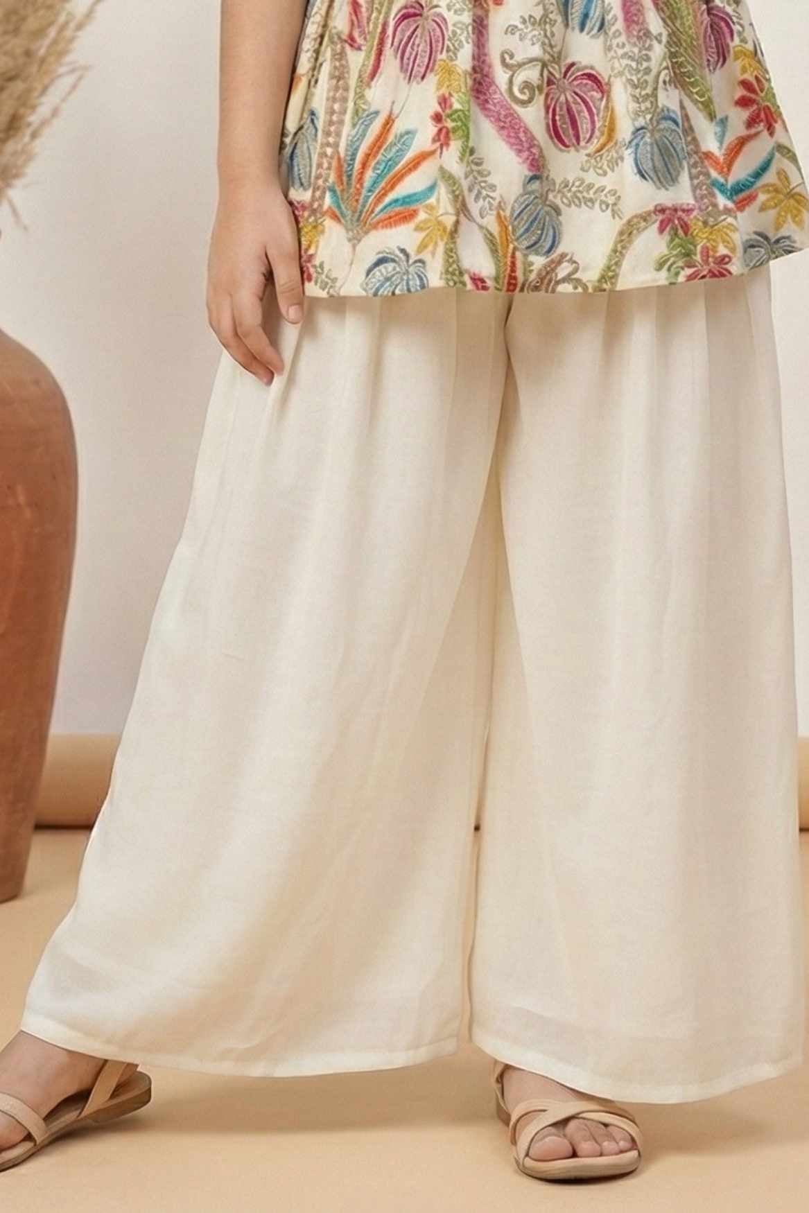 Cream Palazzo Set With Embroidered Multicolor Peplum Top For Girls