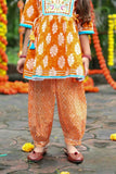 Orange Printed Kurta Dhoti Set with Embroidered Yoke and Tassel Tie-Ups For Girls