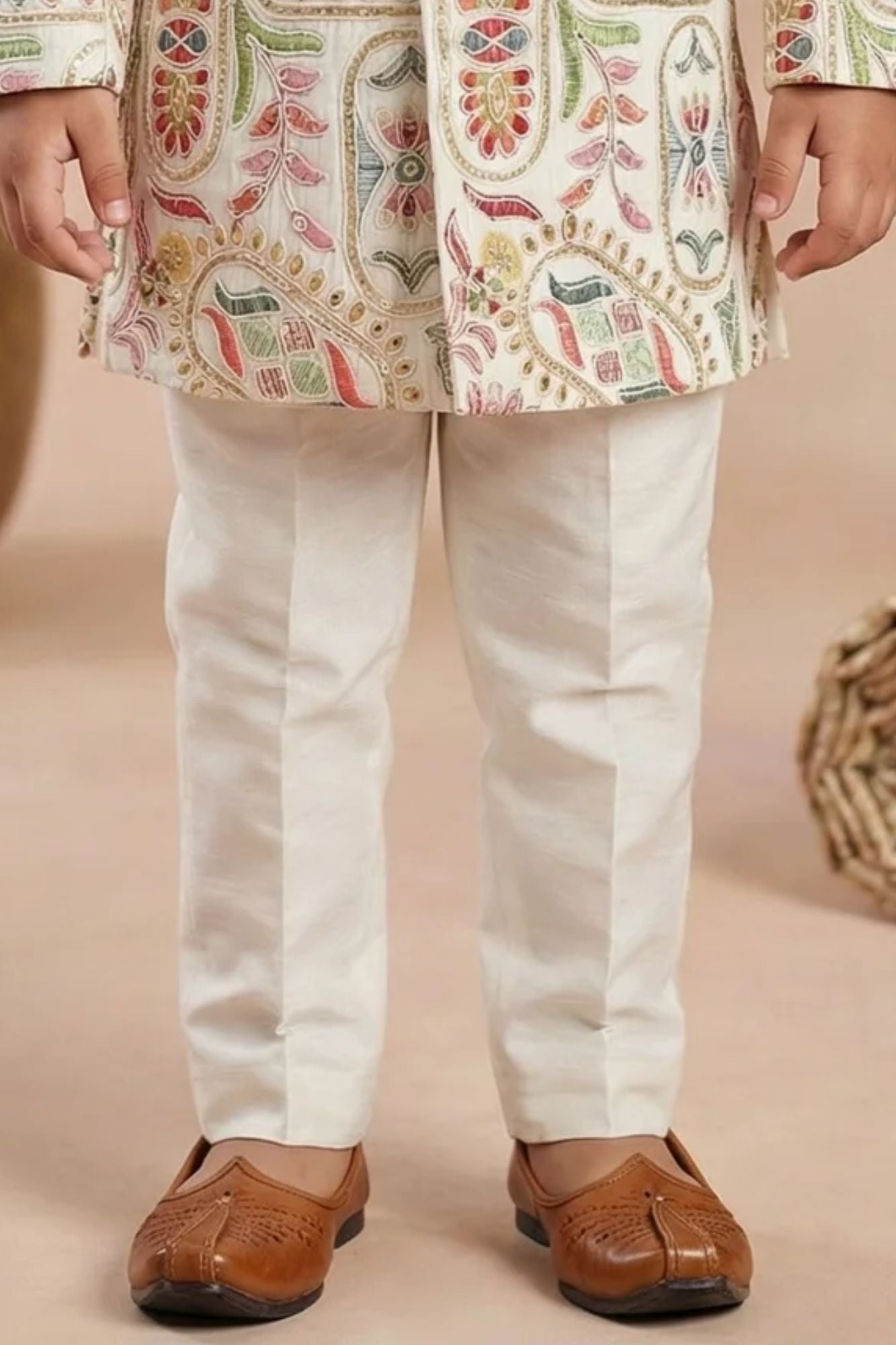 Elegant Boys Cream Jodhpuri Suit With Embroidered Woven Ethnic Motifs