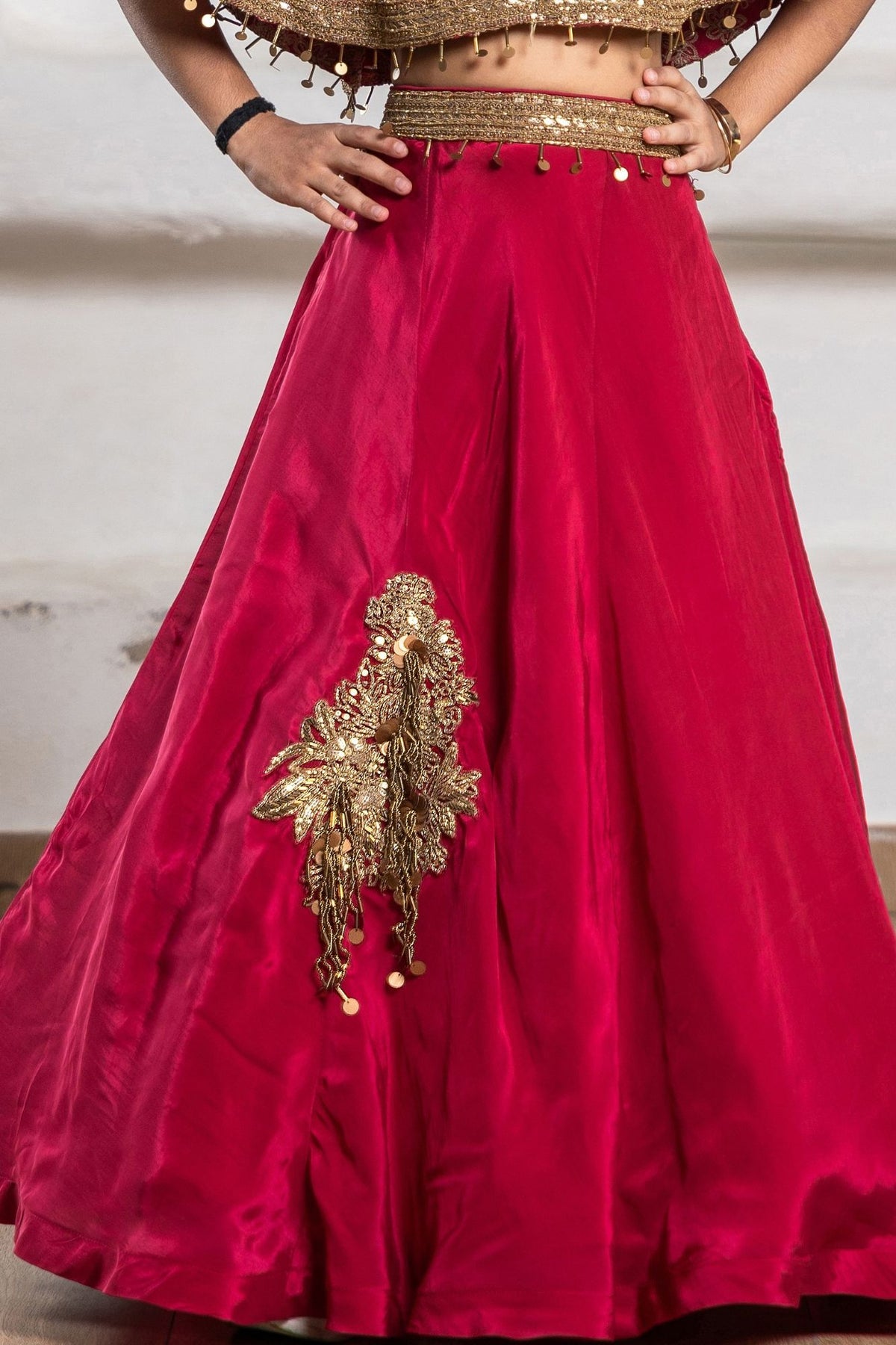 Girls Red And Gold Embroidered Cape Lehenga Choli