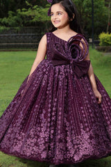 Wine Gown With Bow Embellished And Shimmer Printed For Girls