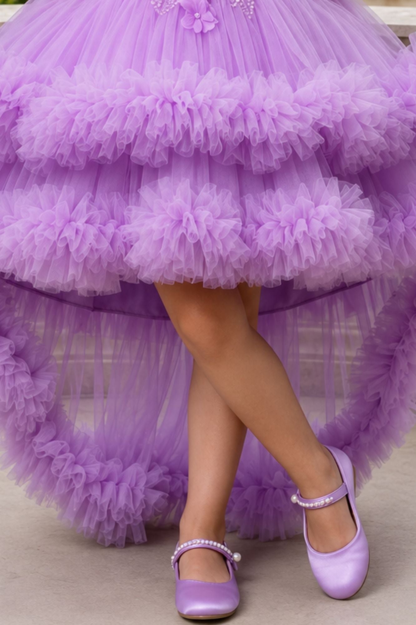 Girls Lavender Ruffle Tailback Party Dress With Pearl And 3D Floral Work