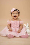 Peach Party Frock with Pleated Flower Appliqué and Shimmer Finish For Girls