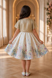 Ivory Floral Party Wear Frock with Golden Jacket And Bow Waist Accent For Girls