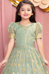 Ethnic Pista Green Brocade Gown With Sequin Embroidery For Girls