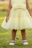Yellow Tulle Party Wear Frock with Oversized Bow For Girls